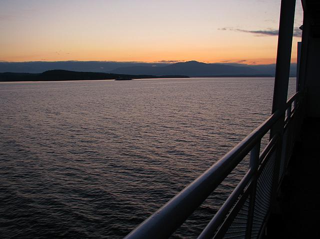 Left click on photo. Then use 'next' and 'previous' arrows to scroll through album.