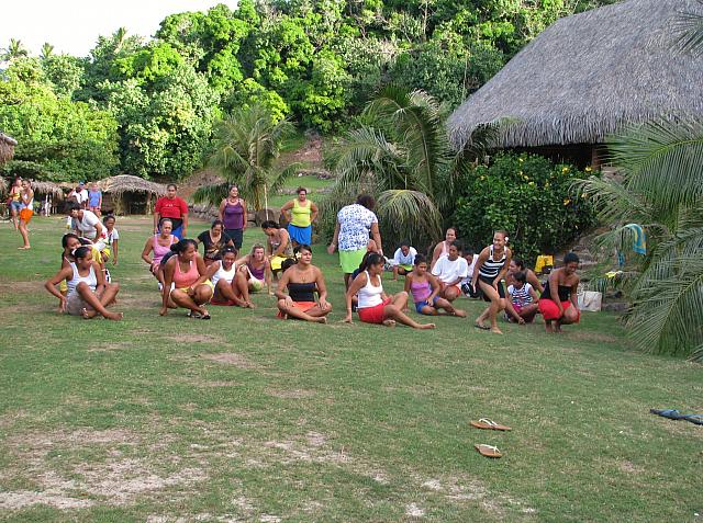 Dancers rest between practice sessions