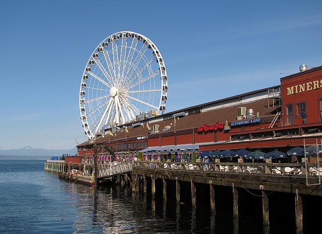 Click on photo, then use 'next' and 'previous' buttons to scroll through in larger format.