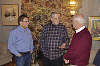 Left click on photo.  Then use 'next' and 'previous' arrows to scroll through album.